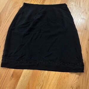 Beautiful lined chiffon skirt with beaded trim.